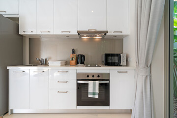 Interior design of kitchen in luxury villa, apartment feature kitchen counter, refrigeratpr, oven,...