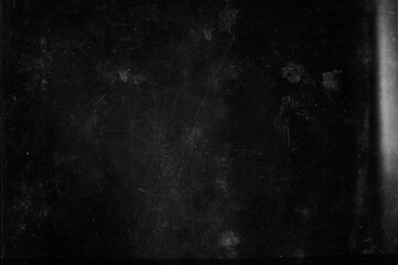 Old black grunge background. Film grain texture imitation