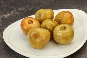 Pickled green tomato in the bowl