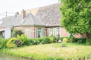 Fototapeta na wymiar Beautiful view of a classic dutch farmhouse
