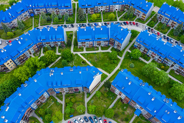 Aerial view of the housing estate with blue roofs. Estate Sloviki located on Witosa street is also called " Smurfs" Olkusz, Poland.