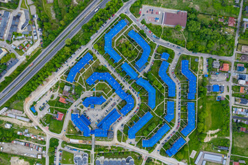 Aerial view of the housing estate with blue roofs. Estate Sloviki located on Witosa street is also called " Smurfs" Olkusz, Poland.