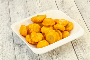 Marinated yellow patisson in the bowl