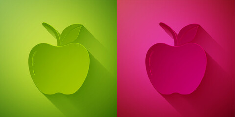 Paper cut Apple icon isolated on green and pink background. Fruit with leaf symbol. Paper art style. Vector Illustration