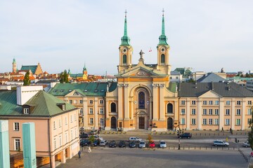 Fototapeta premium Field Cathedral of the Polish Army in Warsaw with Old Town and National Stadium in background