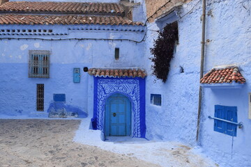 Blue painted doors in the city of Chefchaouen, Morocco
