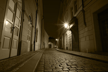 Night street of old Prague Under the light of lanterns