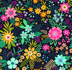 Amazing seamless floral pattern with bright colorful flowers and leaves on a dark blue background. The elegant the template for fashion prints. Modern floral background. Folk style.