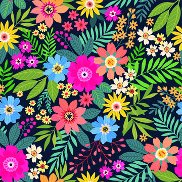 Amazing seamless floral pattern with bright colorful flowers and leaves on a dark blue background. The elegant the template for fashion prints. Modern floral background. Folk style.
