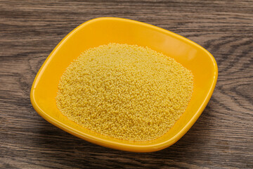 Raw cous cous heap in the bowl