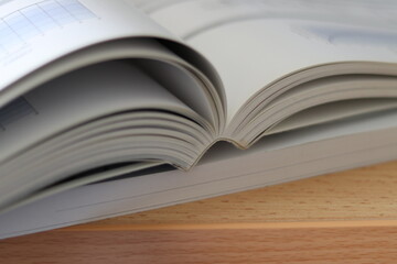 Books, Thick heavy books with white paper and hard cover, good binding, perfect binding, large number of pages, huge page booklet on table
