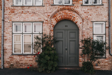 Front door of historical old brick building in Luebeck - Germany