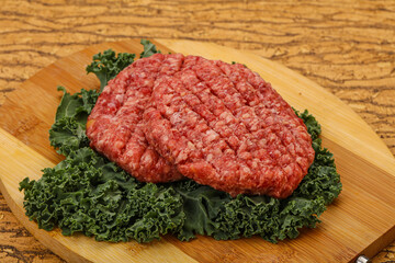 Raw beef burger cutlet for cooking