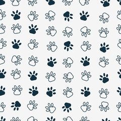Fototapeta premium Seamless vector illustration. Modern art of dog’s paws. Grey background.