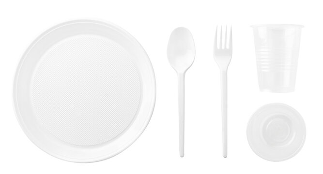 Set of plastic dishes on a white background. The view from top