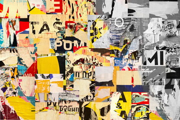 Collage of many numbers and letters ripped torn advertisement street posters grunge creased...