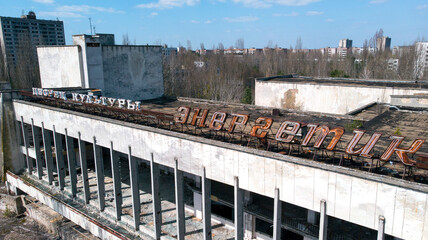 Fototapeta premium Pripyat aerial panorama cityview. . Drone flies over the deserted abandoned city of Pripyat, Ukraine. Exclusion zone near the Chernobyl nuclear power plant.