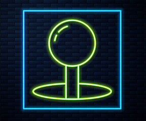 Glowing neon line Push pin icon isolated on brick wall background. Thumbtacks sign. Vector Illustration
