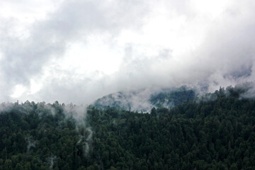 Fototapeta na wymiar Mountain cloudscape and landscape in Georgia