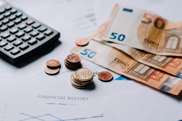 Close-Up coins in money graph financial statistics.
