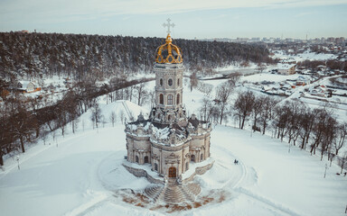 Orthodox Church in the neo-Gothic style in a city near Moscow with a Golden dome
