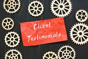 Business concept about Client Testimonials with inscription on the sheet.