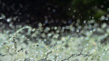 Water backgrounds with foam spray fast flow.