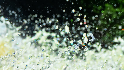 Water backgrounds with foam spray fast flow.