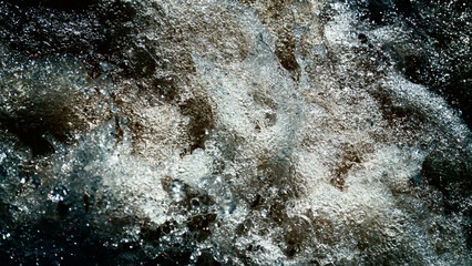 Water backgrounds with foam spray fast flow.