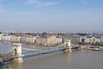 Fototapeta na wymiar View of Szenchenyi Chain bridge over Danube river in Budapest winter
