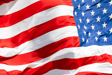 American flag waving in the wind, US flag motion close-up, United States of America national flag. USA stars and stripes