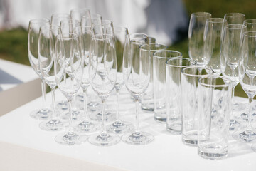 Festive glasses on the festive table during the Banquet. Alcoholic beverage