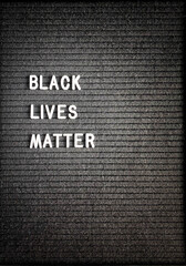 Dark black letter board with BLACK LIVES MATTERS white title on it.
