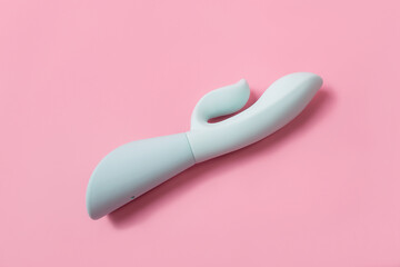on a pink background sex product, toy for adults