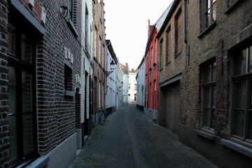 Fototapeta na wymiar A narrow walkway between Old Town buildings.