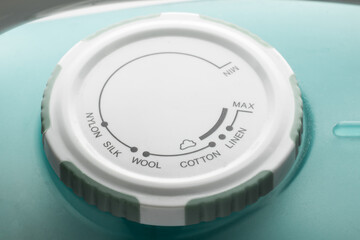 Round plastic rotary temperature controller and the choice of modes of ironing on an electric iron