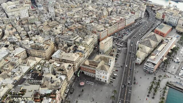 Panoramic Aerial View of Historic Buildings, Highway and Quay of Genoa City (Italy)