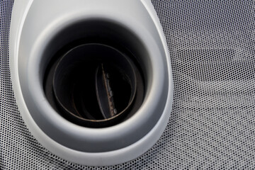 Close-up exhaust pipe of a sports car.