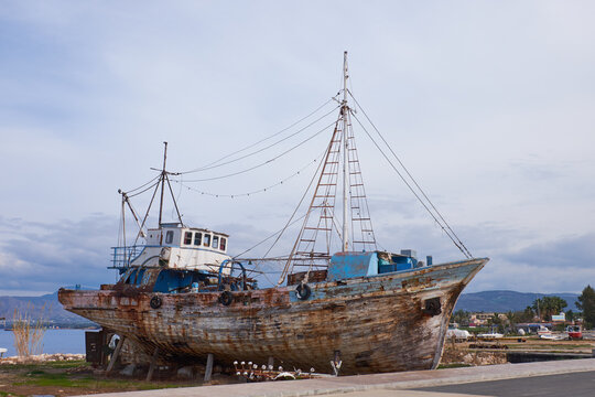 old wreck of a fishing in landscape scenery at the Mediterranean Sea Latsi cyprus