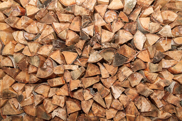 Pinned birch wood are in a pile in drevenice