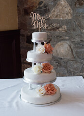 Wedding cake with orange flowers