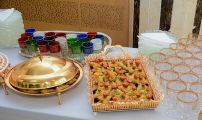 Moroccan tea glasses and biscuits.