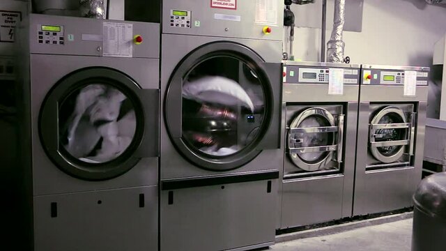 Large industrial washing machines in the hotel laundry