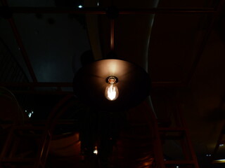 Vintage light bulb In a dark room