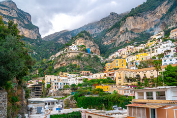 Fototapeta na wymiar Beautiful colorful houses on a mountain in Positano, a town on Amalfi coast