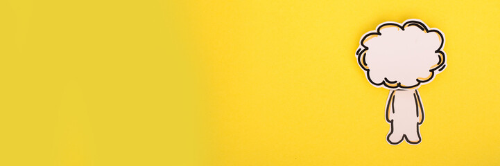 Paper human icon with speech bubble on the yellow