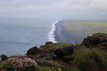 icelandic coast with a black sand beach