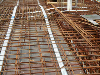 Hot-rolled deformed steel bars or steel reinforcement bar tied together before casting in the...