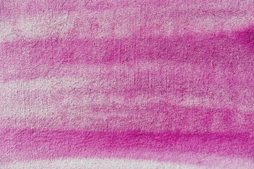 pink background: the white wall is unevenly painted with pink paint sprayed with an aerosol can