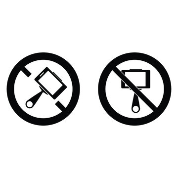 No selfie icon. prohibited sign.  No monopod icon. 